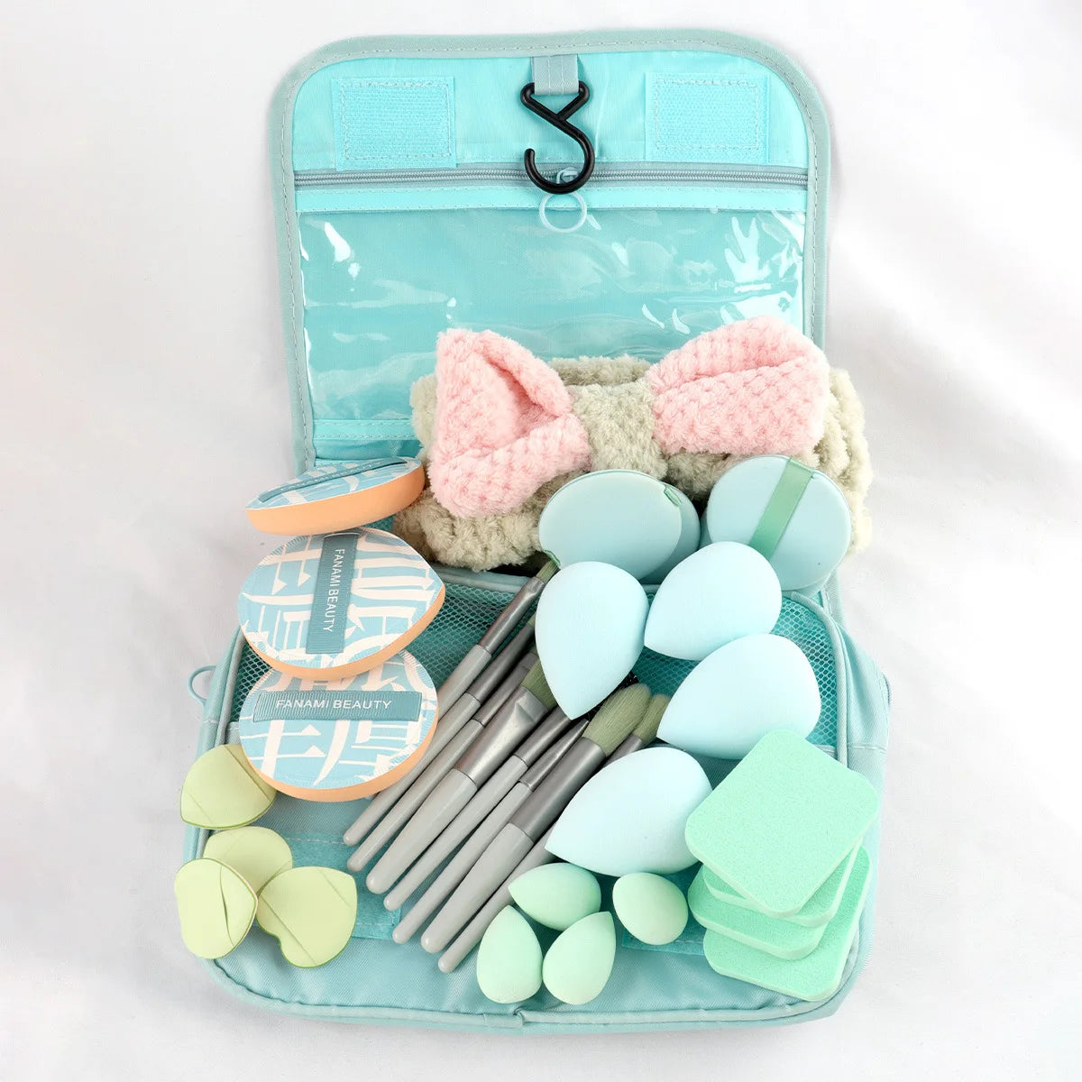 Multi piece set of beauty tools, blue hair with water droplets, powder puff, skin friendly, soft makeup brush, complete set