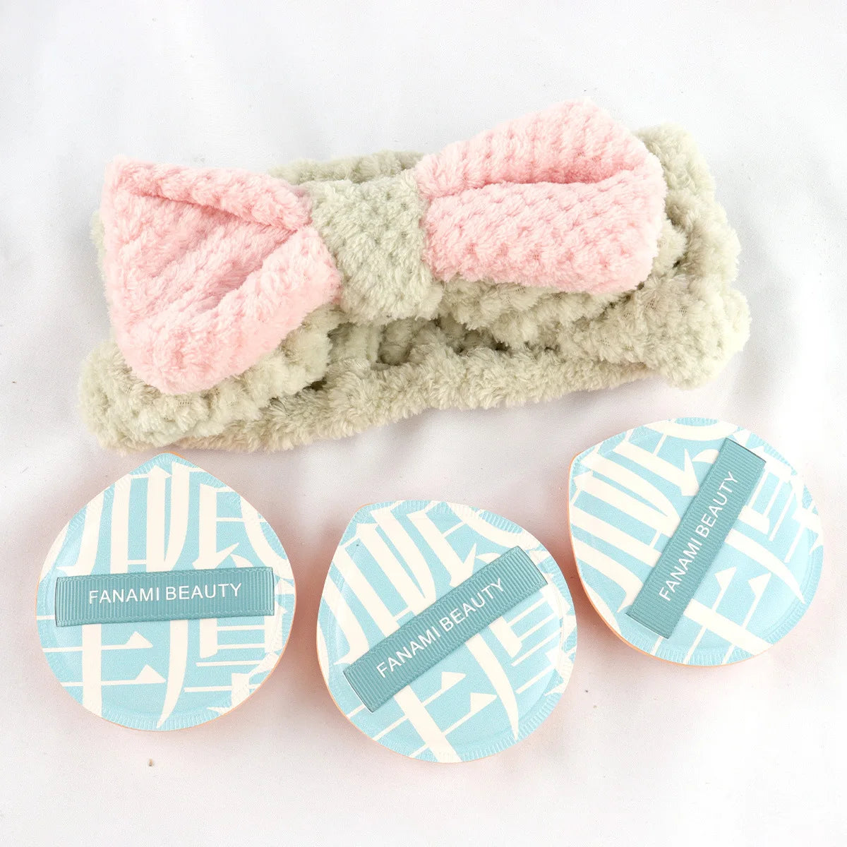 Multi piece set of beauty tools, blue hair with water droplets, powder puff, skin friendly, soft makeup brush, complete set